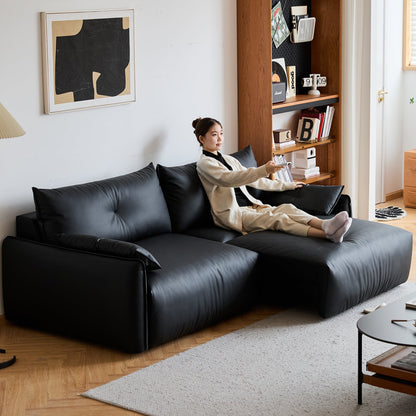 Modern genuine leather electric recliner 2 seater sofa in real life style.
