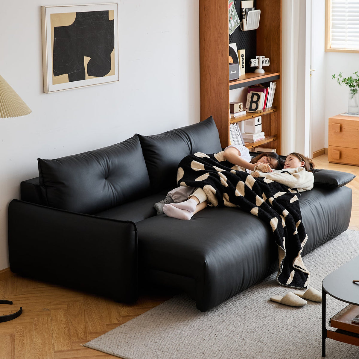 Modern genuine leather electric recliner 2 seater sofa in close up details.